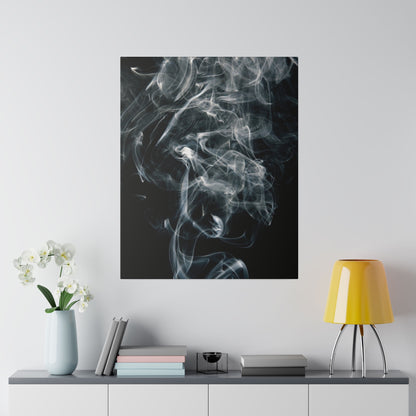 Square canvas wall art depicting white smoke swirls on a black background, hung above a gray cabinet.