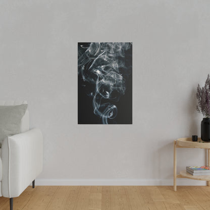 Vertical black wall art featuring white smoke swirls on a dark gradient, hung on a light gray living room wall.