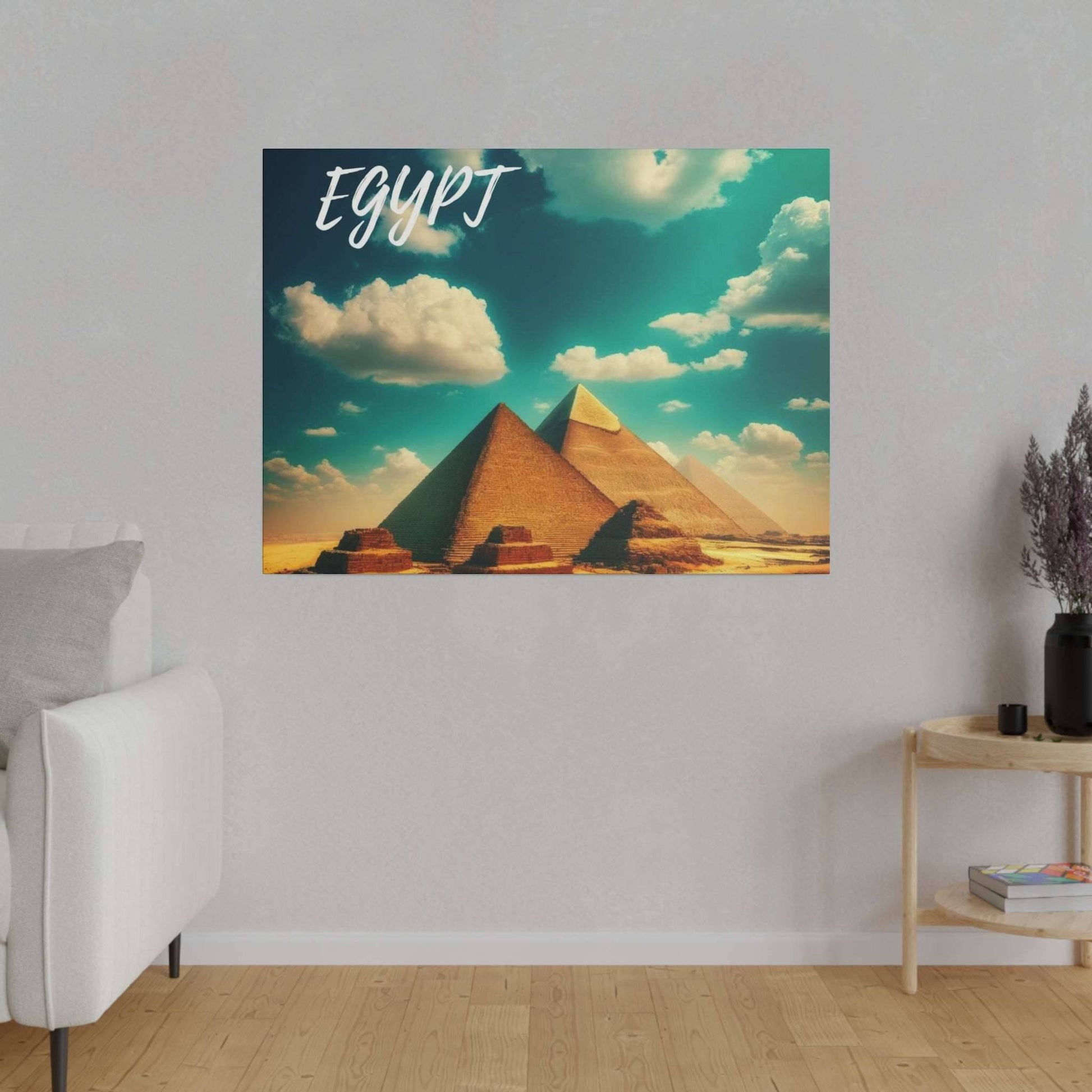 Square canvas wall art showing the pyramids of Giza under a blue sky with clouds; the word Egypt appears in white script at the top left.