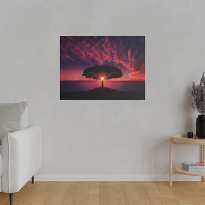 Framed sunset photo of a lone tree atop a hill overlooking the ocean with a red-purple sky.