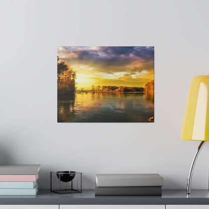 Canvas print of a river at sunset with orange-yellow sky, reflective water, and tree-lined banks.