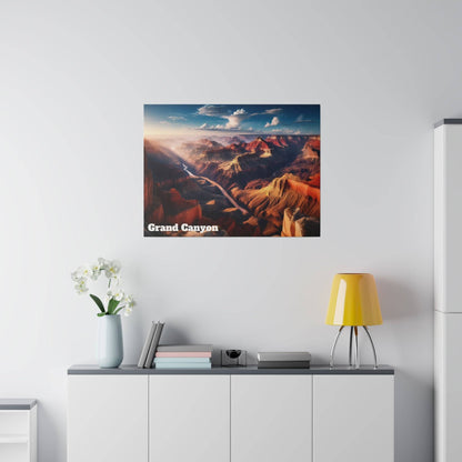 Framed Grand Canyon landscape poster on a white wall above a cabinet with books, a vase, and a yellow lamp.