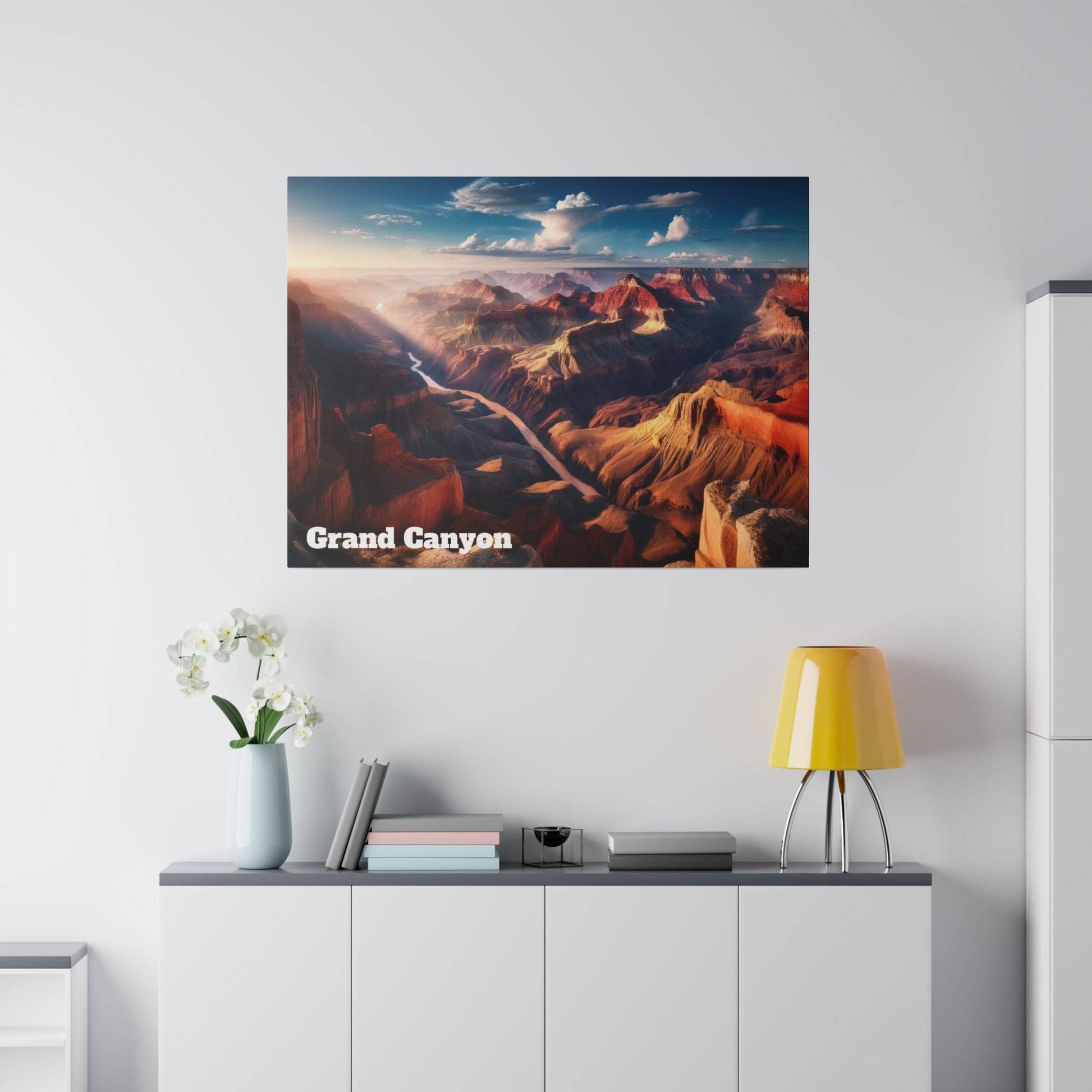 Poster of a Grand Canyon landscape with orange canyon walls and a winding river, on a light gray wall.