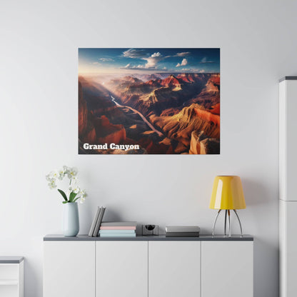 Poster of a Grand Canyon landscape with orange canyon walls and a winding river, on a light gray wall.