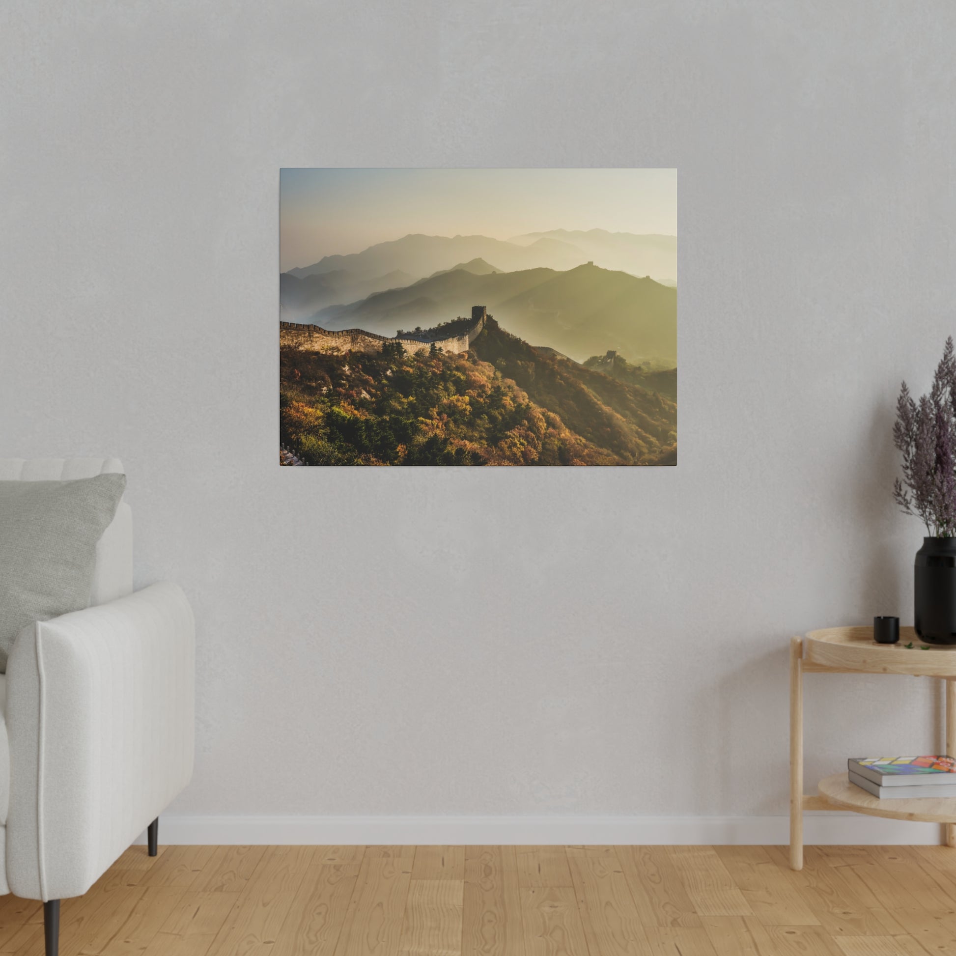 The Great Wall of China winding along the mountain path, illuminated by the soft morning sunlight.