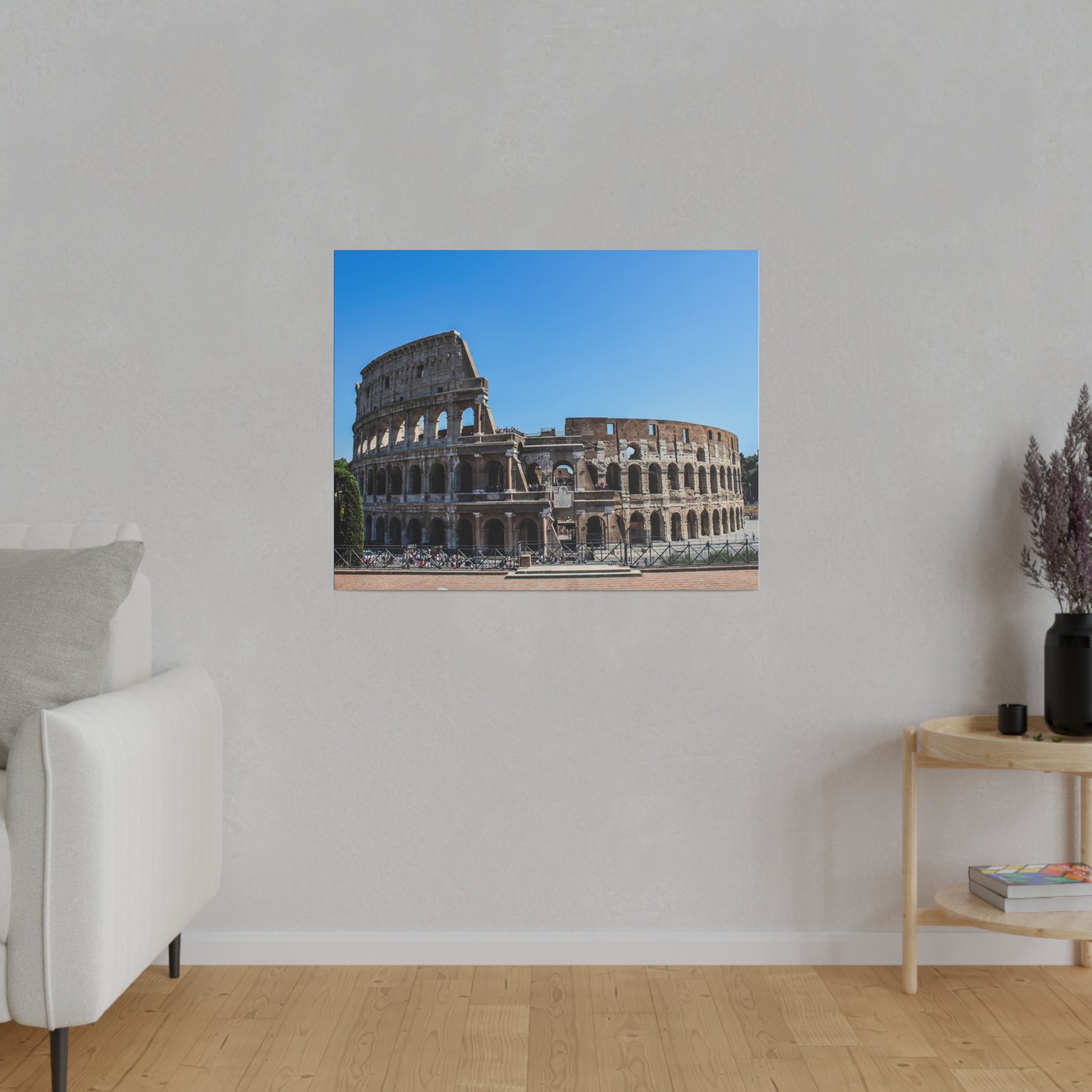 A historic view of the Roman Colosseum, showcasing its grand architecture and the surrounding area filled with tourists.