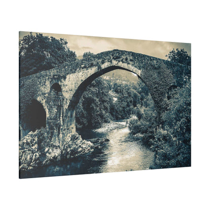 Canvas print of a historic stone arch bridge over a river, surrounded by trees, in blue-green monochrome.