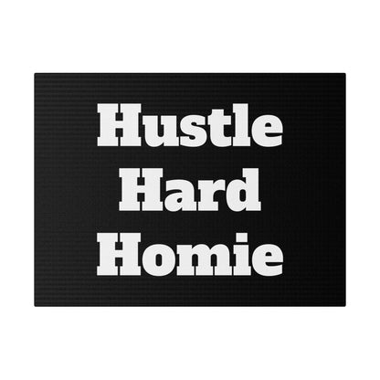 Black textured doormat with large white text reading “Hustle”, “Hard”, “Homie” in three lines.