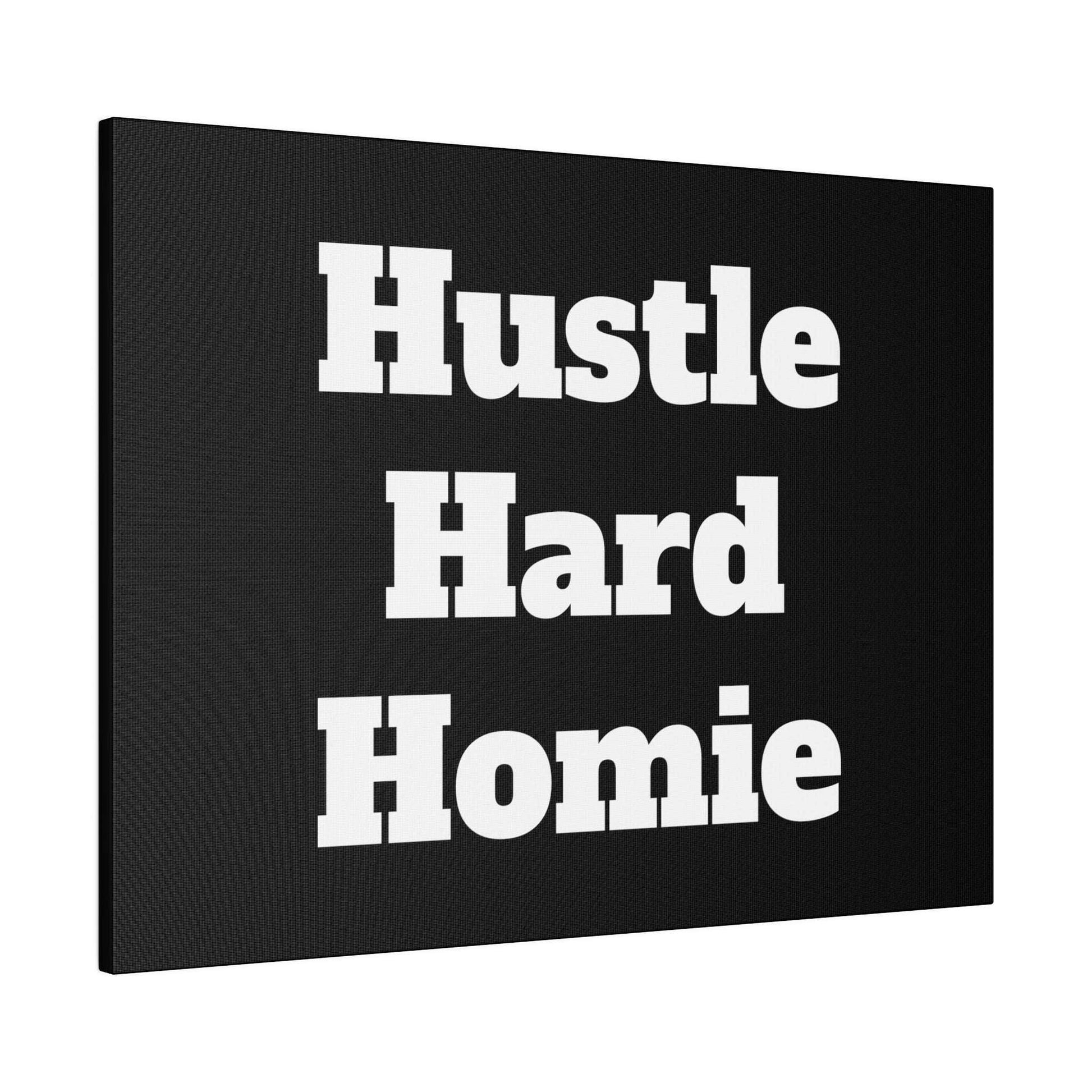 Black canvas wall art with bold white text reading “Hustle Hard Homie” arranged in three lines.