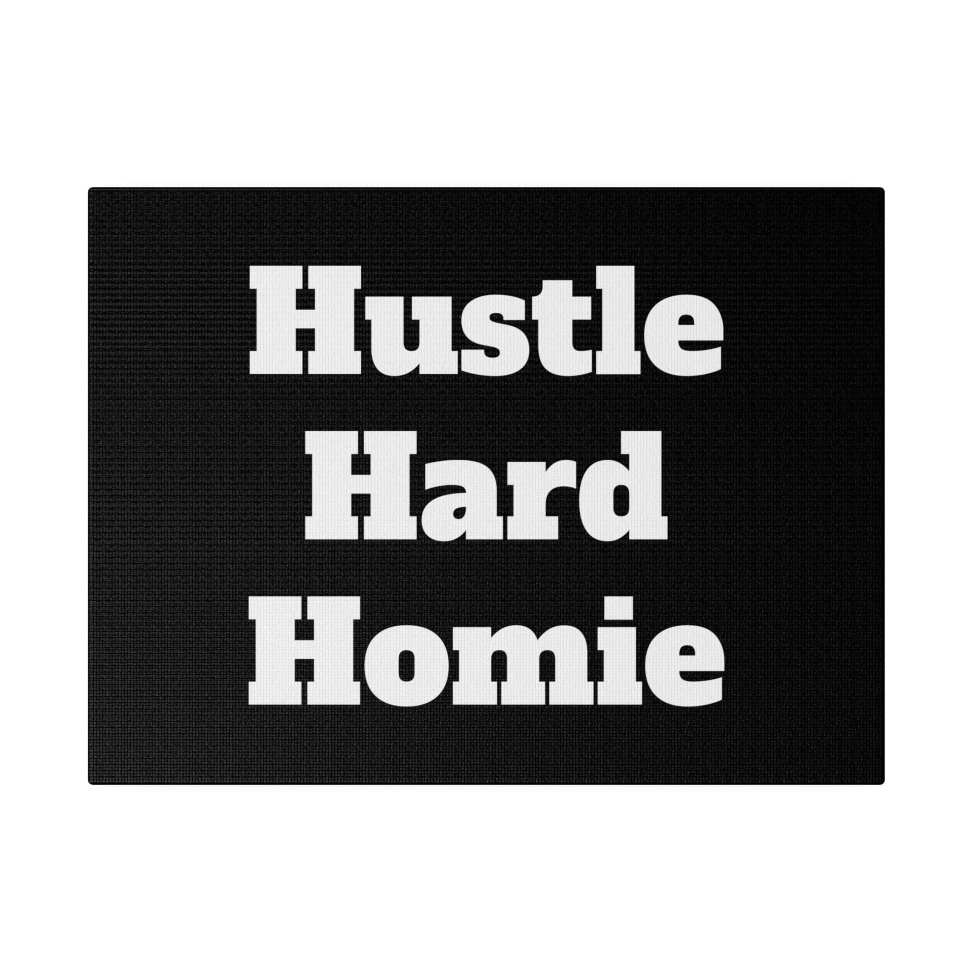 Rectangular black fabric mat with bold white text reading "Hustle Hard Homie" centered across three lines.