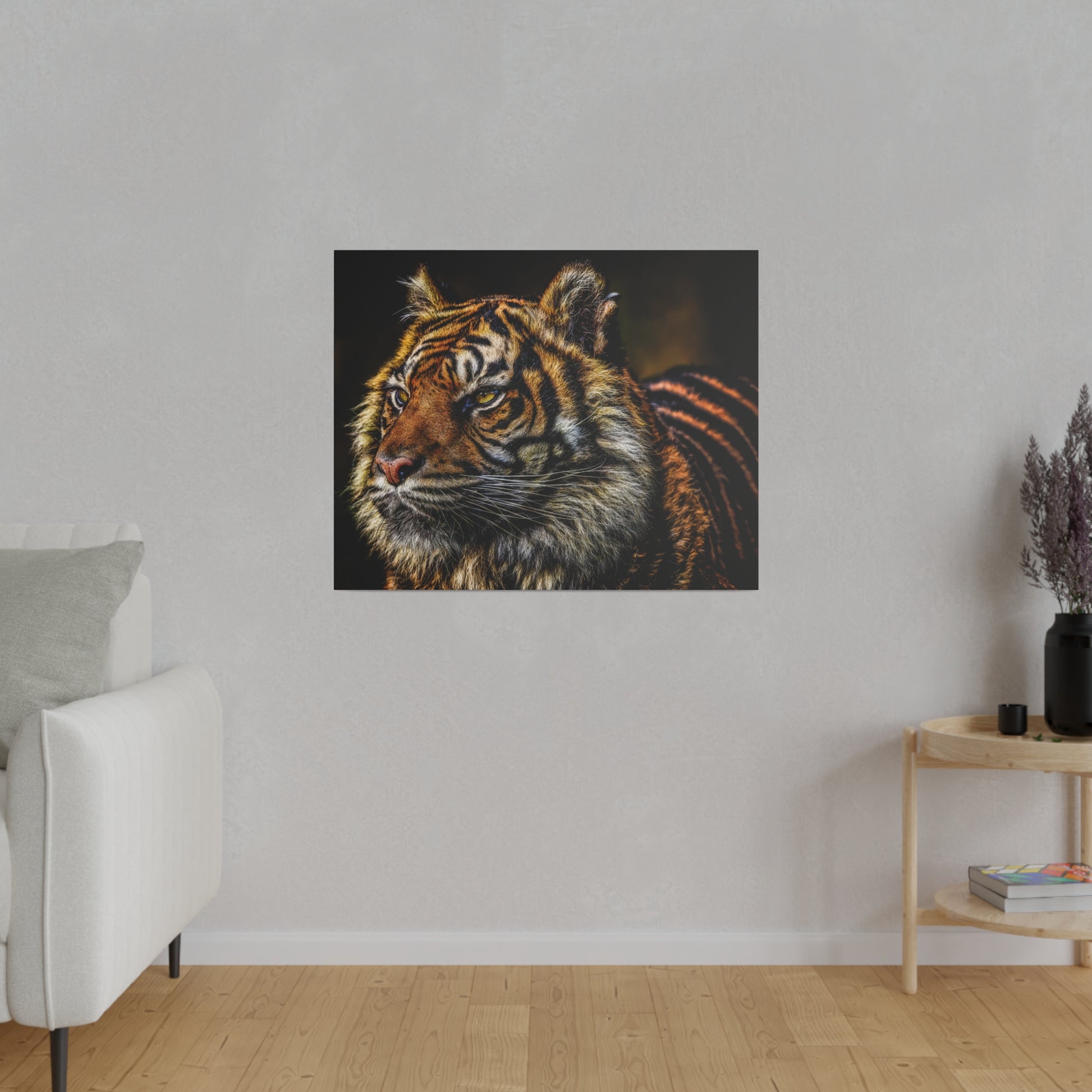 An intense tiger gaze captured in a close-up portrait, revealing the depth and power in the tiger's eyes. The detailed view emphasizes the tiger's striking appearance.