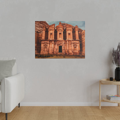 Framed photo of the Treasury at Petra, a sandstone facade with ornate arches and a central doorway.