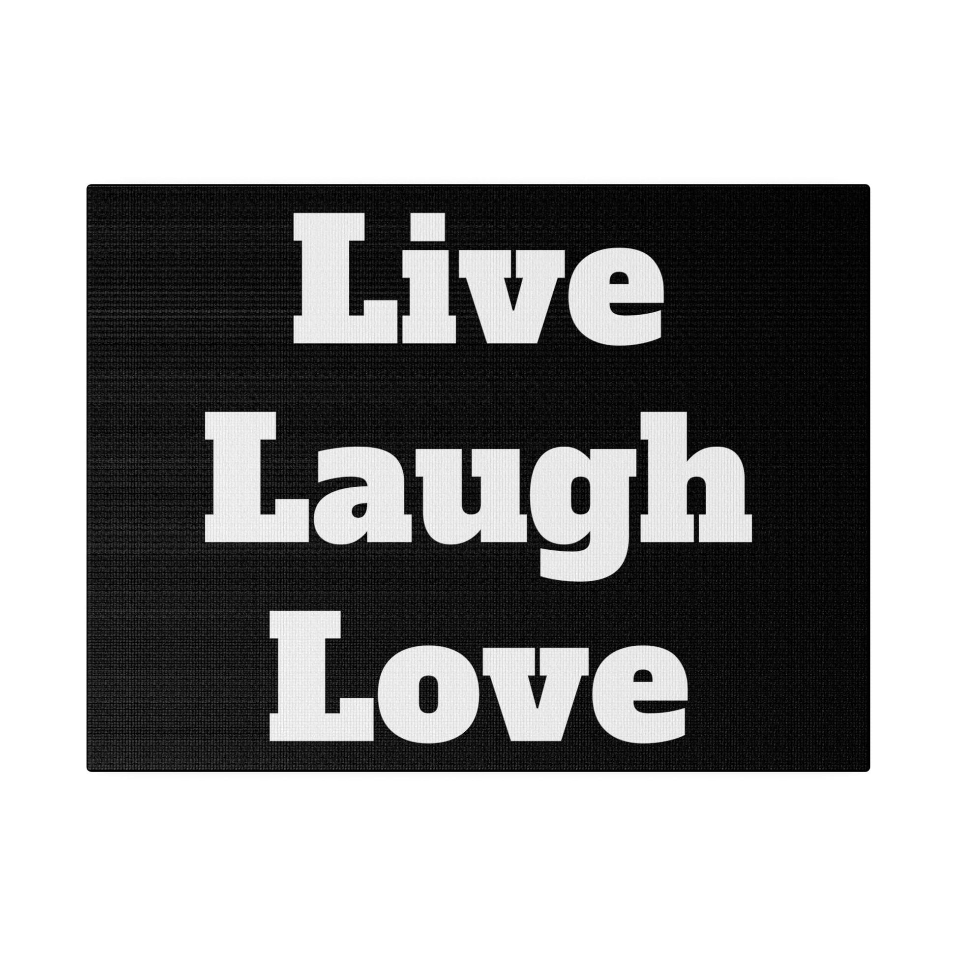 Black doormat with bold white text reading Live Laugh Love arranged in three lines.
