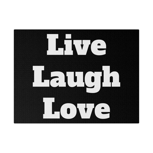 Black doormat with bold white text reading Live Laugh Love arranged in three lines.