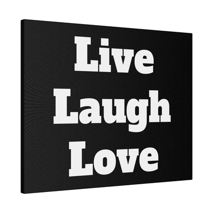 Black canvas wall art with large white text reading Live Laugh Love.