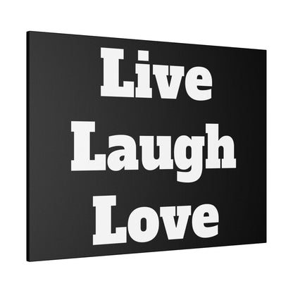 Black canvas wall art with large white lettering displaying the phrases 'Live', 'Laugh', and 'Love' stacked in three lines.
