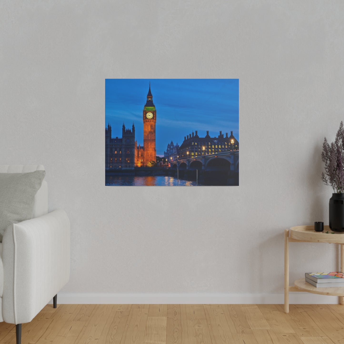 Big Ben in London glowing warmly in the evening light, with the adjacent buildings and the River Thames adding to the picturesque scene.