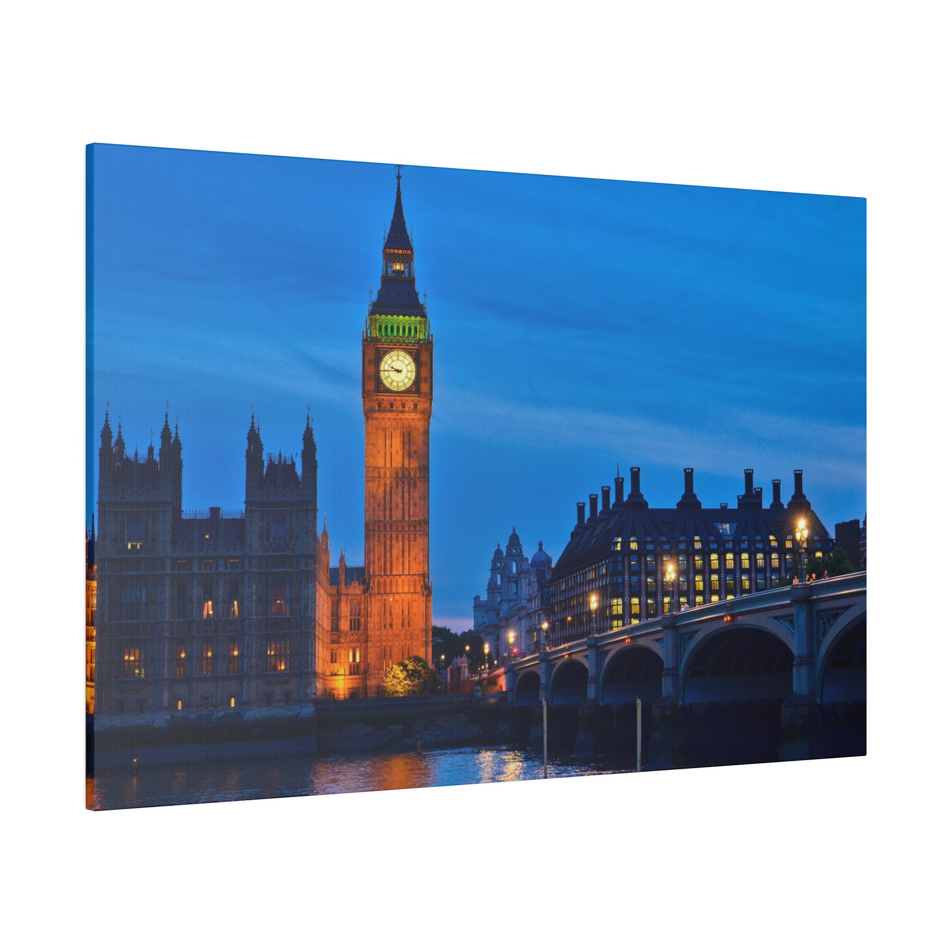 Big Ben illuminated at night in London, with the city’s historic buildings and the calm waters of the River Thames creating a beautiful backdrop.