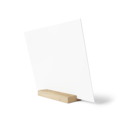 Clear acrylic display panel on a light wood rectangular base, angled upright.