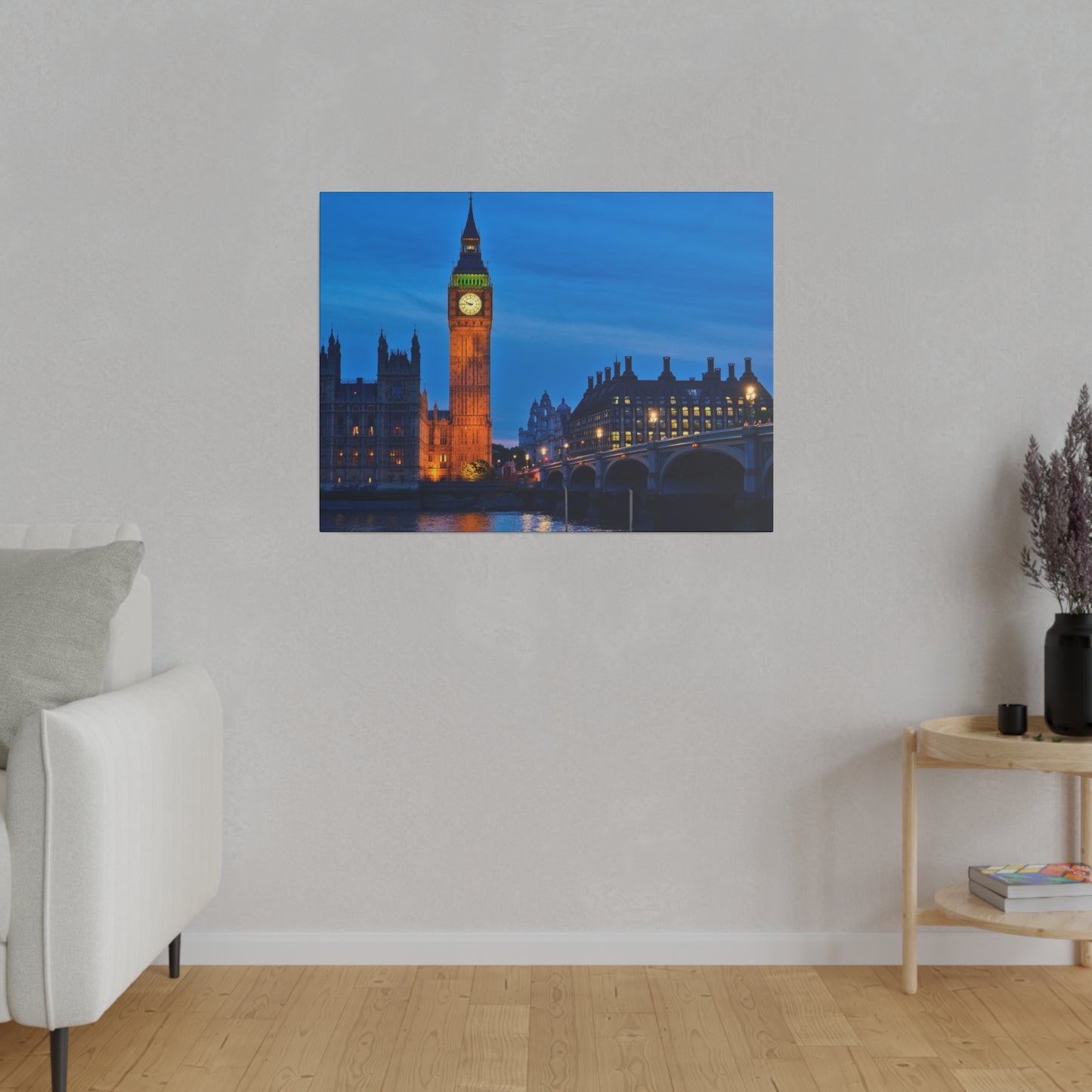 A captivating night view of Big Ben’s clock tower in London, beautifully illuminated against the evening sky, with historic buildings nearby.