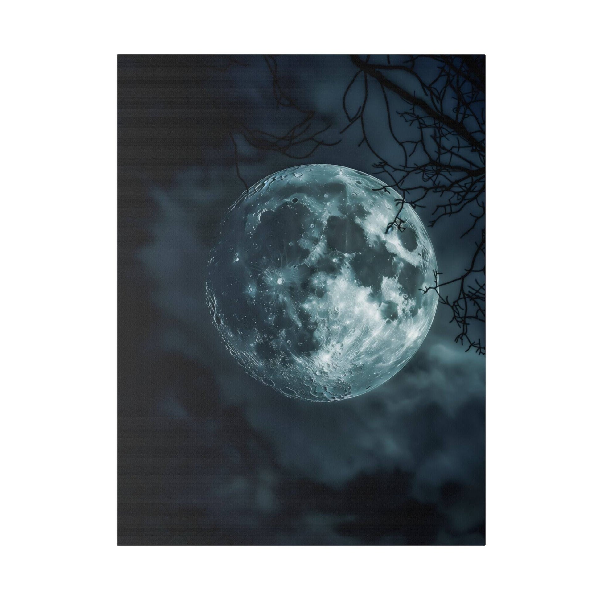 Blue-toned full moon against a dark, cloudy sky with bare tree branches in the foreground.