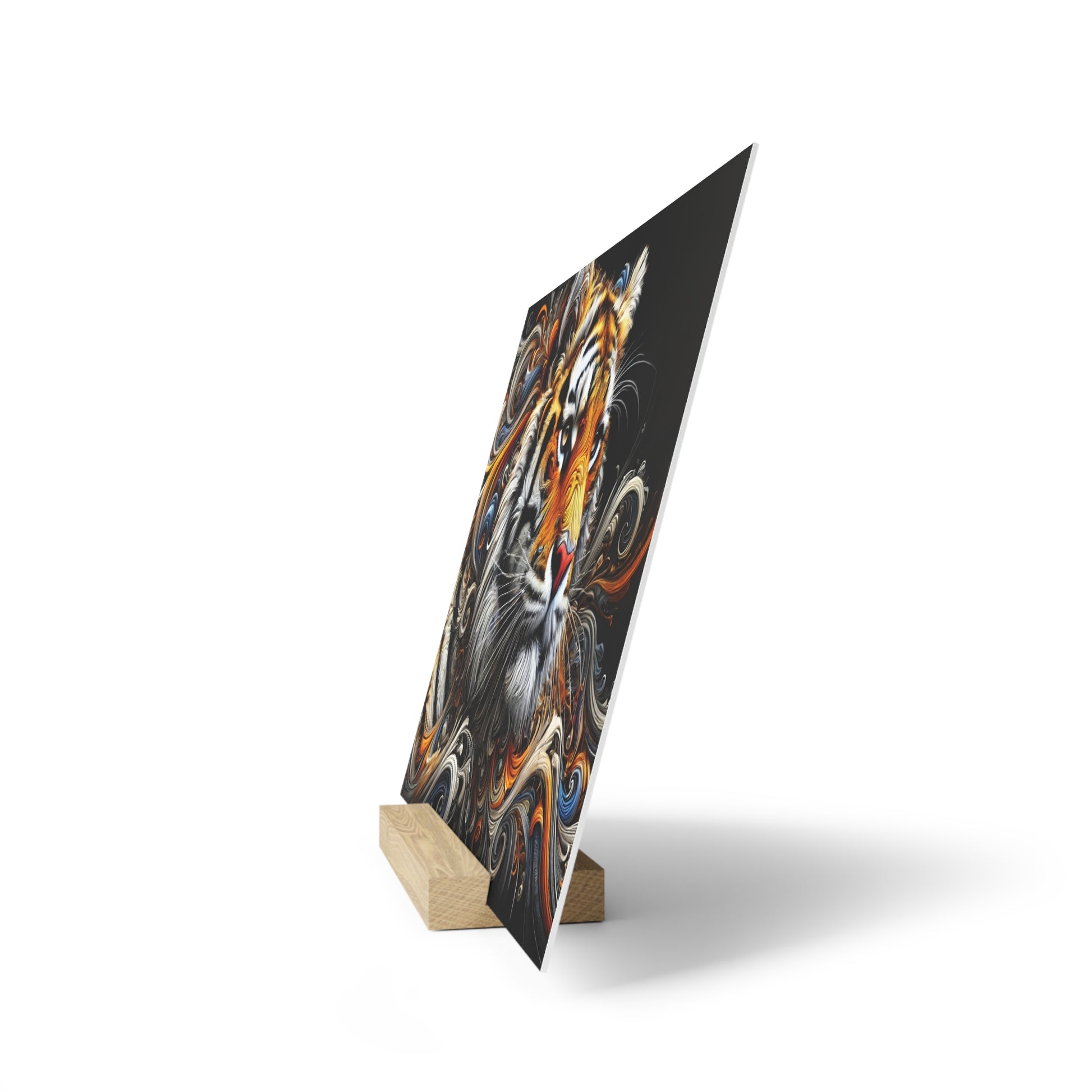 Tilted black art print on a light wood easel, showing a colorful swirling tiger design on a dark background.