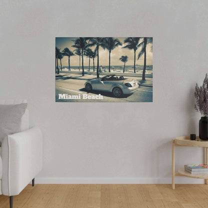 Canvas art showing a silver convertible along a palm-lined beach street with "Miami Beach" text in the lower left.