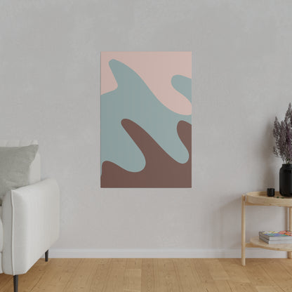 Abstract pastel canvas with pink, blue, and brown organic shapes mounted on a light gray wall.
