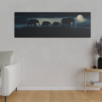 Panoramic wall art depicting silhouettes of elephants walking in a line under a full moon on a dark blue night.