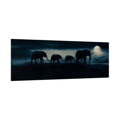 Panoramic wall art showing a silhouette of four elephants walking in a dark, moonlit landscape.