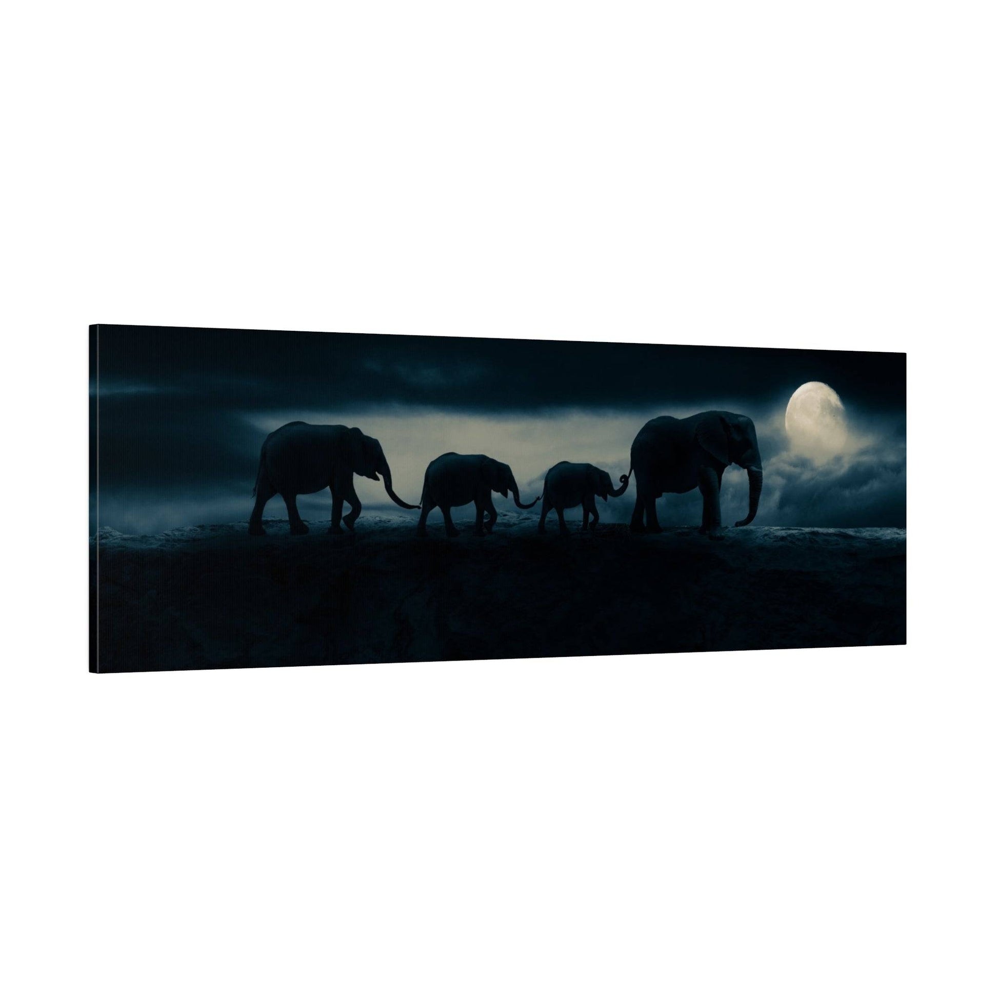 Silhouettes of a family of elephants walking along a dark night landscape beneath a full moon.