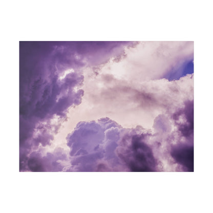Purple and lavender storm clouds fill the sky with soft pink light.
