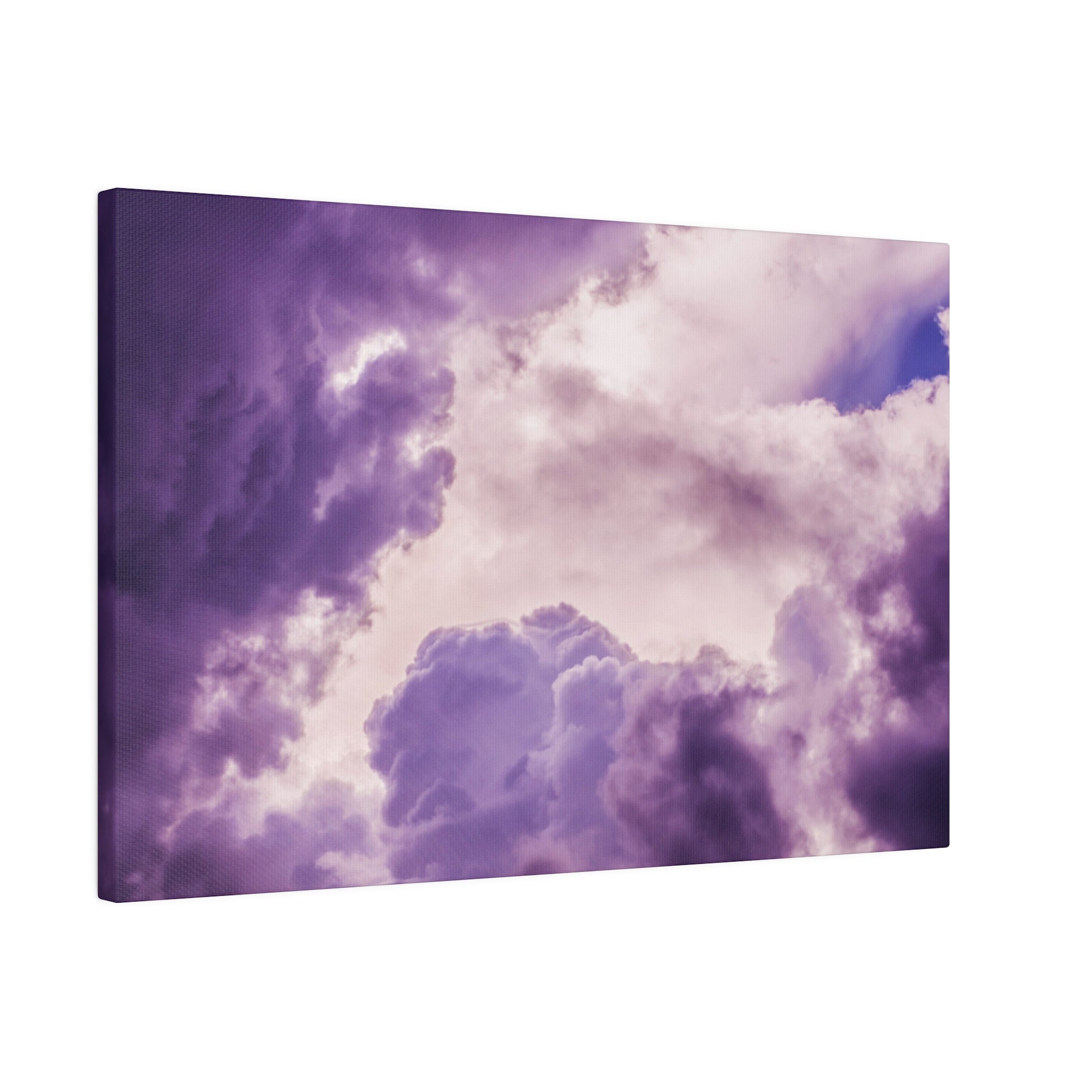 Canvas print of a purple lavender cloudscape with billowing pink-tinged clouds.