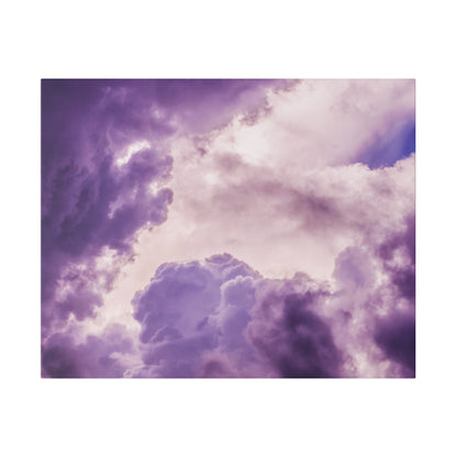 Purple cloudy sky with large, billowy clouds in various shades of purple.