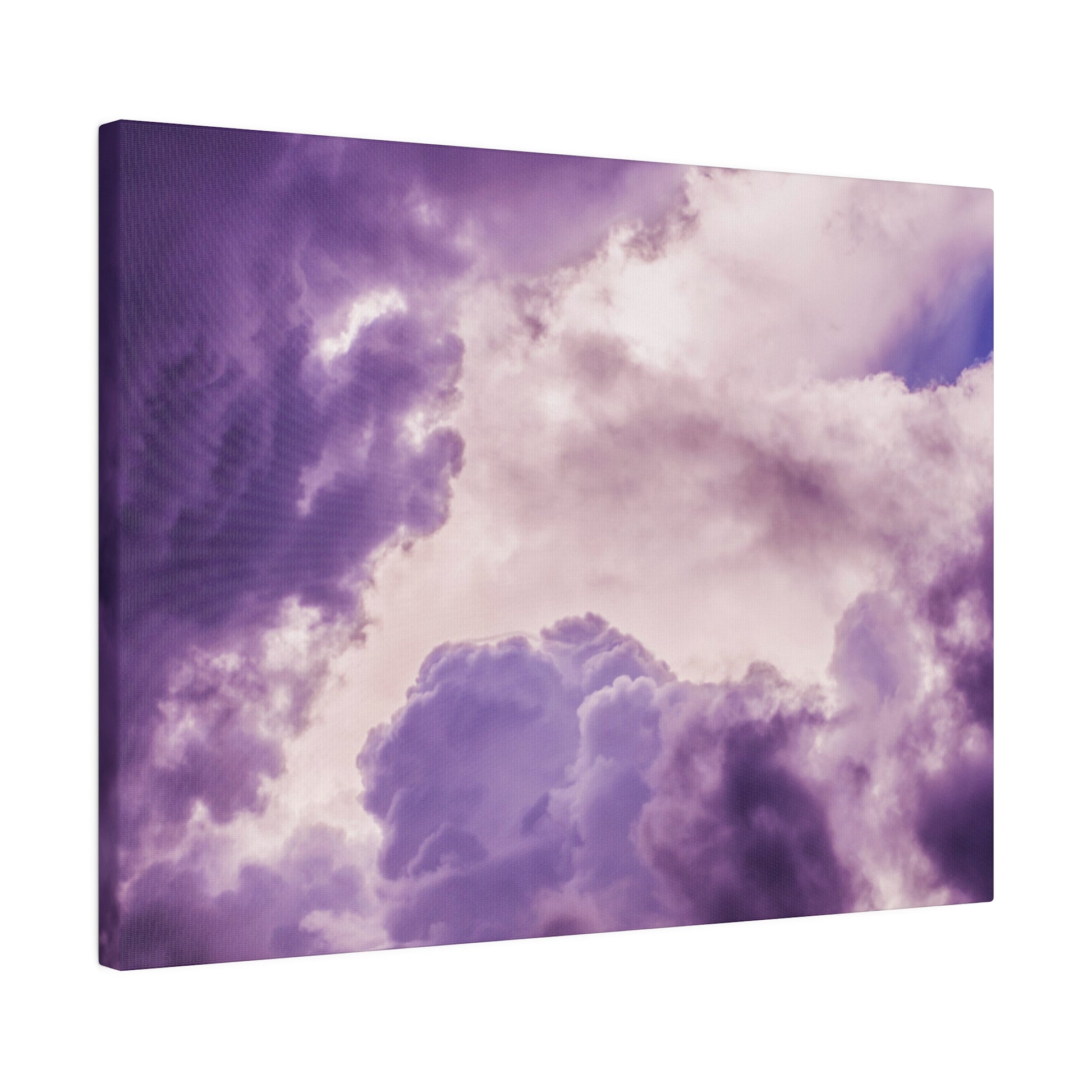 Purple-toned canvas print showing fluffy clouds in a dramatic lilac sky.