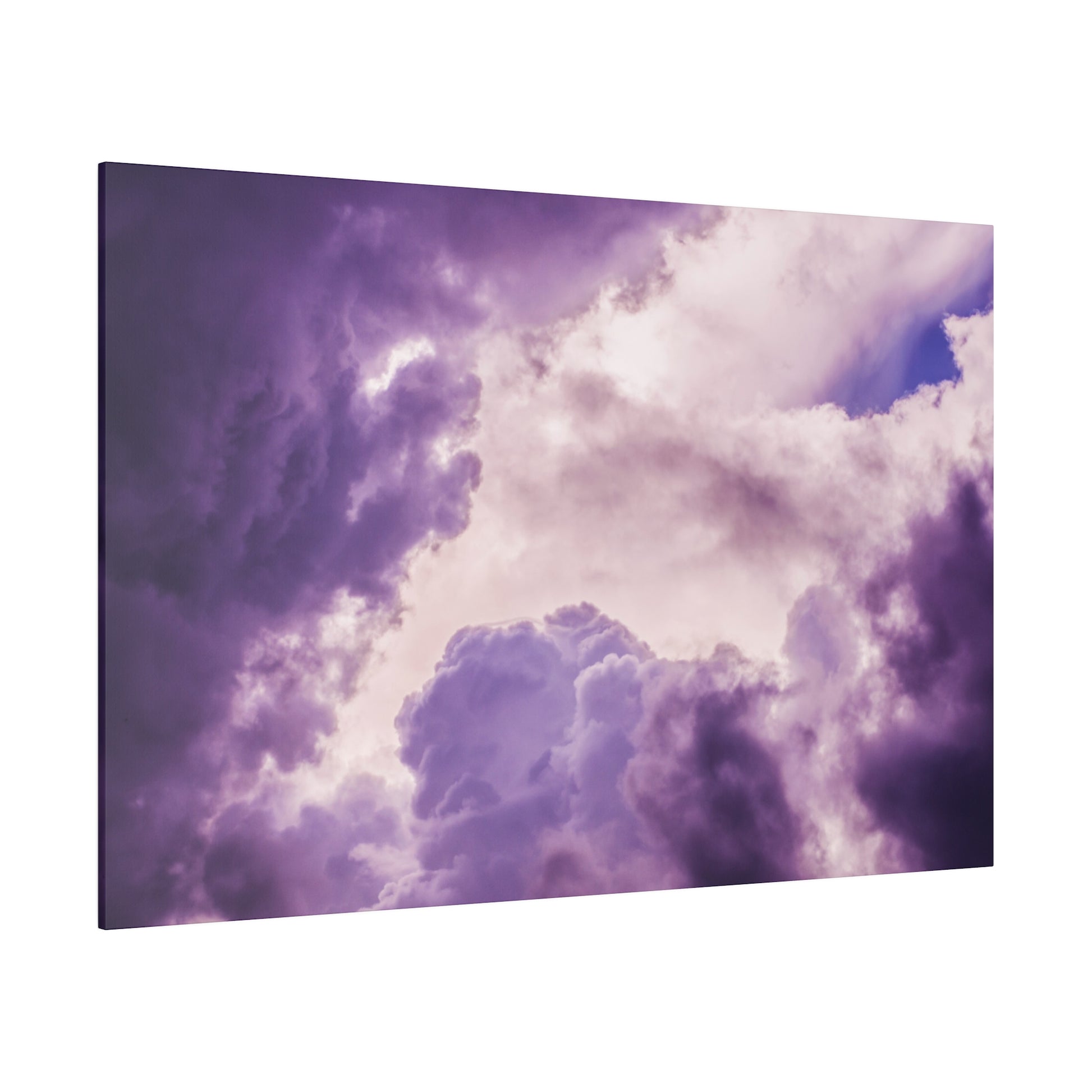 Canvas print of a purple and pink cloudy sky with soft, dramatic clouds.