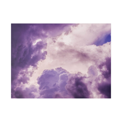 Purple and pink clouds fill a cloudy sky with light and dark violet tones.