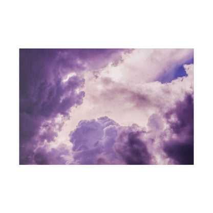 Purple cloudy sky with varying shades of violet and pink, featuring dramatic, billowy clouds.