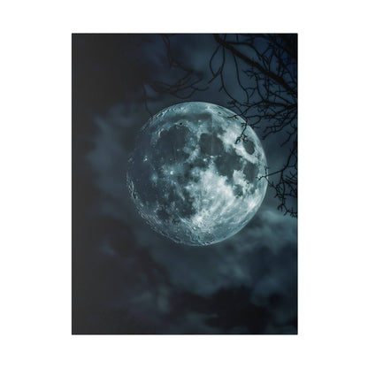 Large full moon with blue-gray surface visible through dark night sky and bare tree branches.