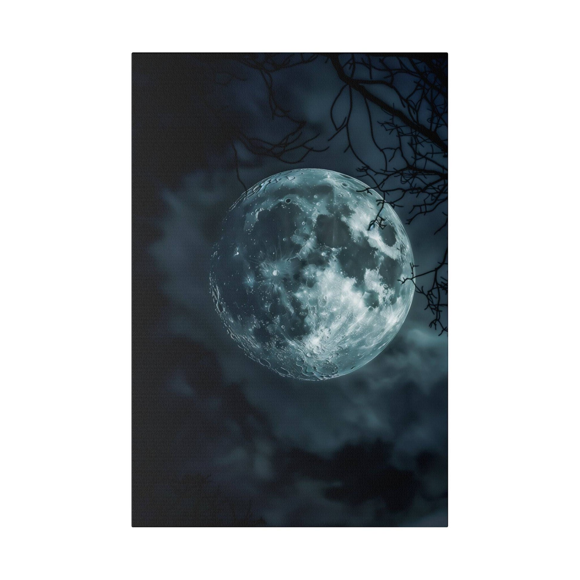 A large blue-tinted full moon in a dark, cloudy night sky with bare tree branches in the foreground.