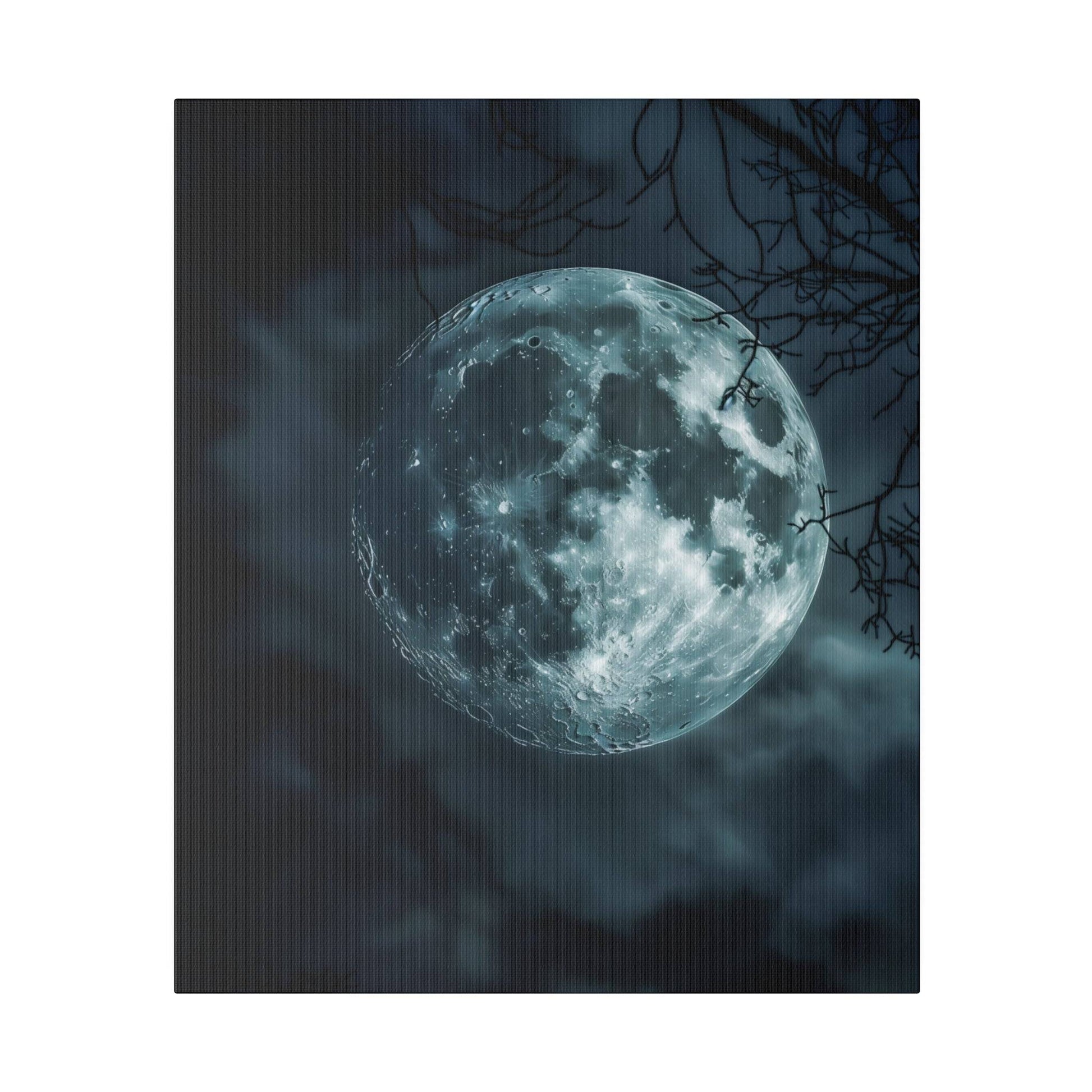 Large full moon glowing blue in dark night sky with bare tree branches in foreground.