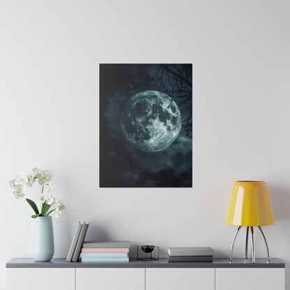 Poster of a glowing full moon against a dark sky with tree branches hangs on a light gray wall above a sideboard.