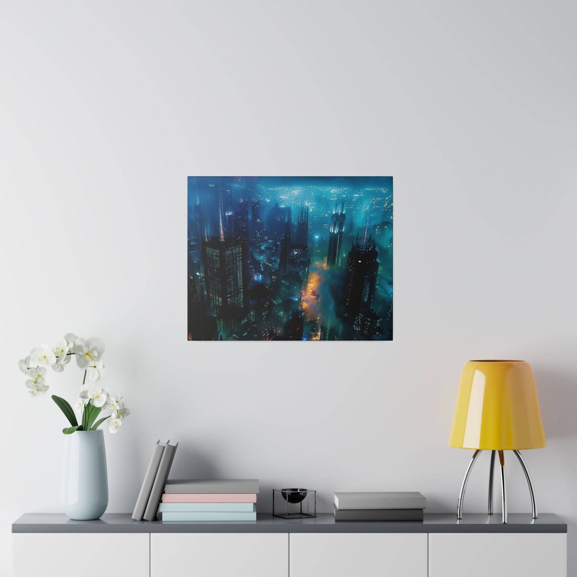Blue-toned city skyline artwork on a light gray wall above a desk with a yellow lamp and white vase.