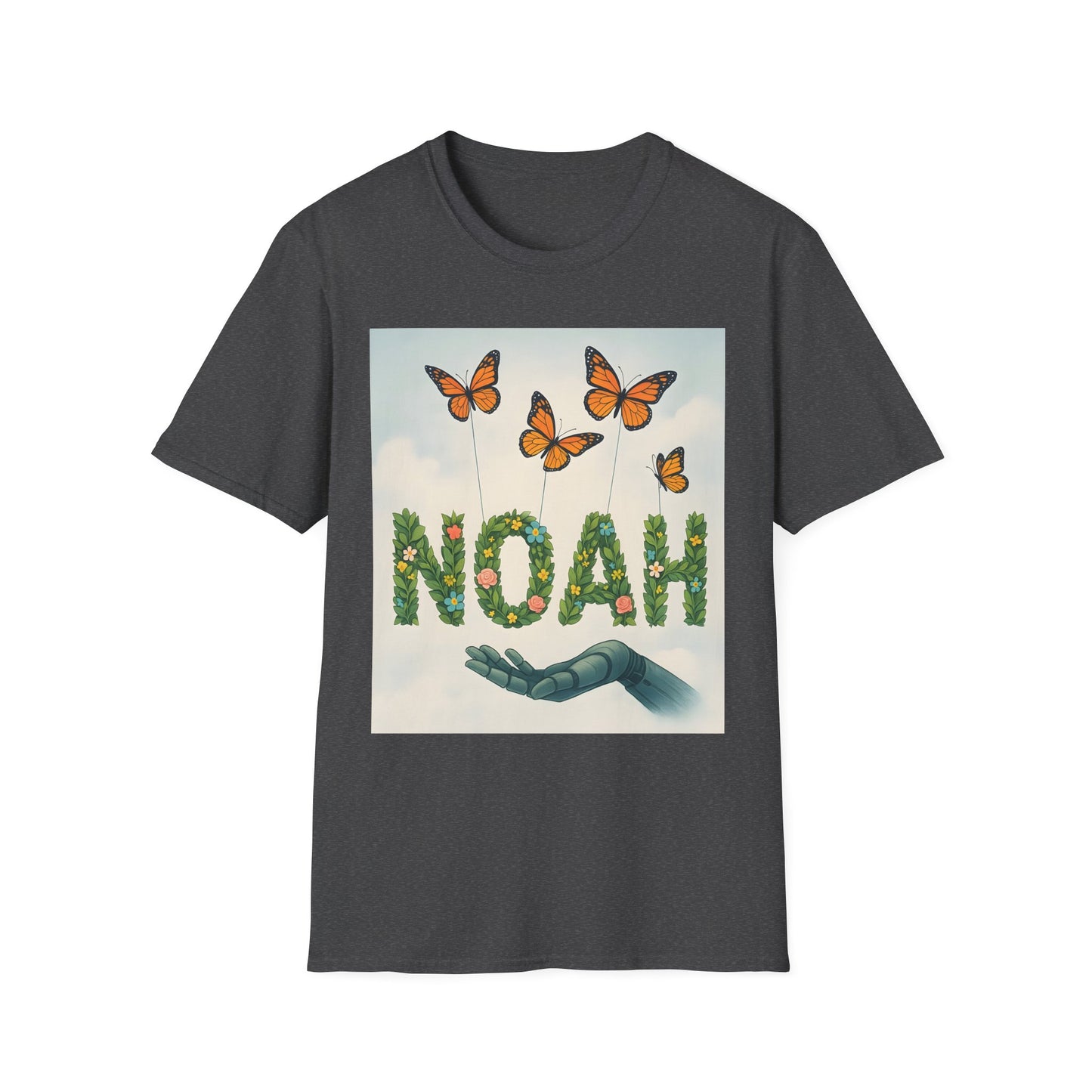 Dark gray t-shirt featuring the word NOAH formed from green leaves and flowers, with orange butterflies above and a blue hand beneath.