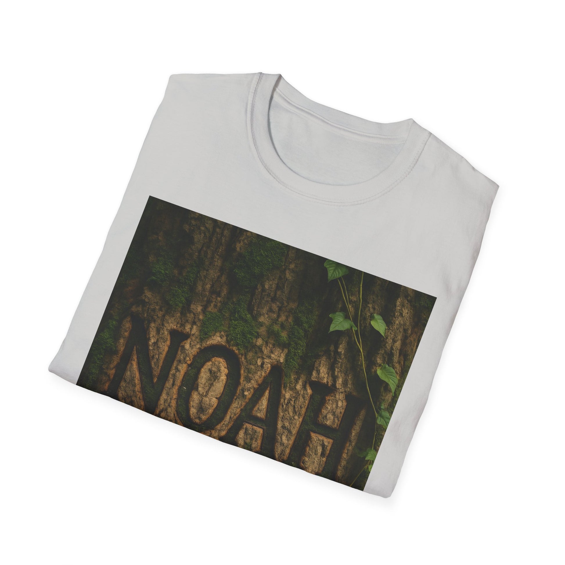 White crewneck T-shirt with a rectangular photo print of a tree trunk and green ivy, showing the word "NOAH" carved into bark.