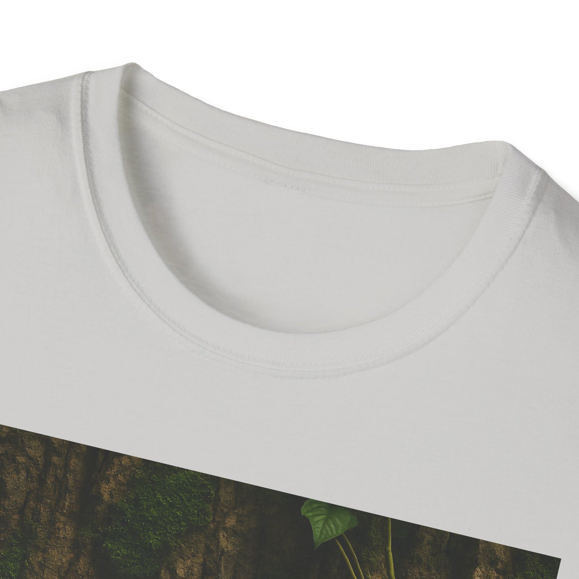 Close-up of a white crew-neck T-shirt with a partial forest scenery graphic along the bottom edge.