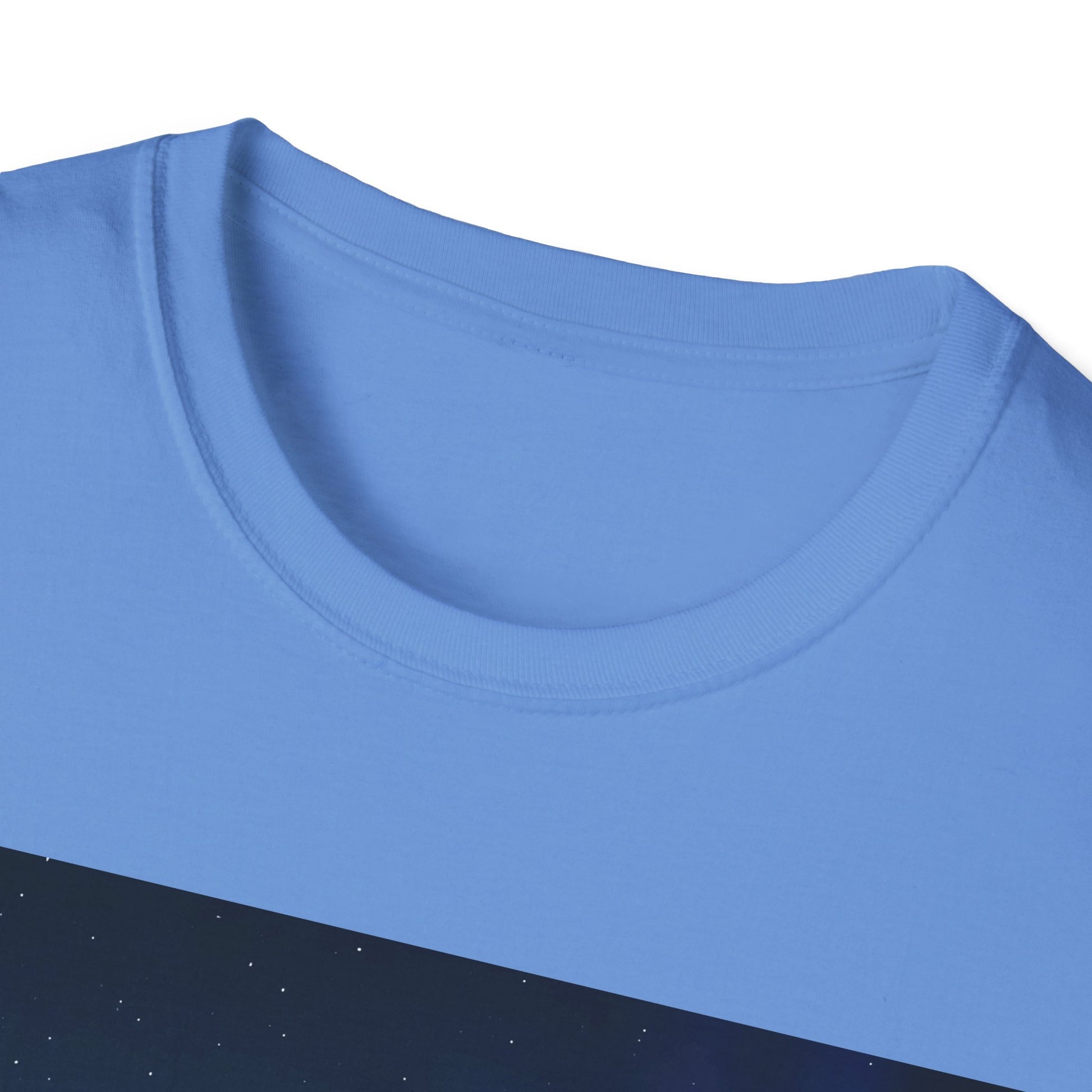 Close-up of a light blue crewneck T-shirt showing the ribbed collar and a partial dark blue graphic with small white specks.