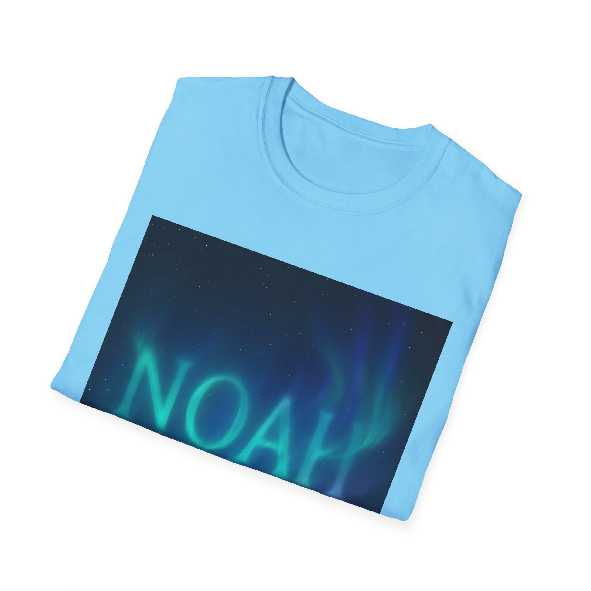Light blue T-shirt folded with a dark rectangular print of night sky and aurora, with the letters NOAH partially visible.