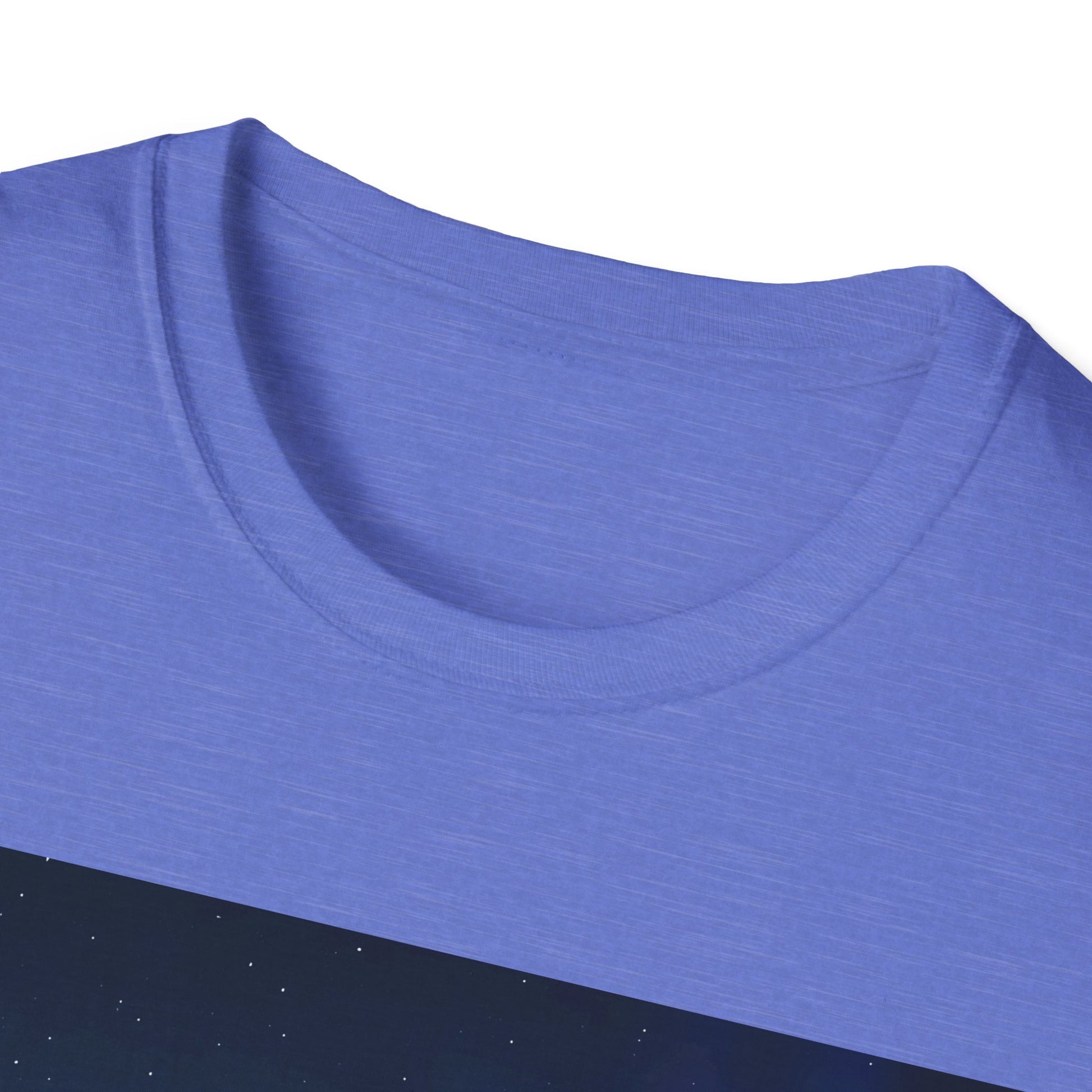 Close-up of a blue crew-neck T-shirt fabric with visible texture and stitching around the neckline.