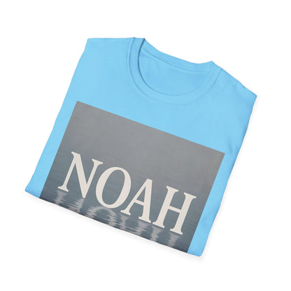 Light blue crew-neck T-shirt with a large gray rectangle graphic and the white word NOAH, plus a subtle water-reflection pattern at the